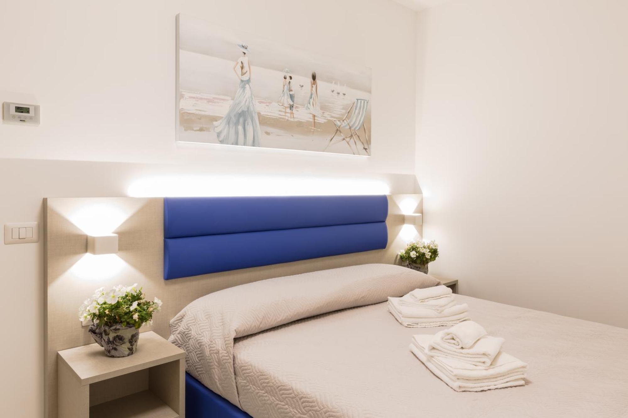 Residence Perla Verde 리치오네 객실 사진